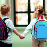 Young children walking to school